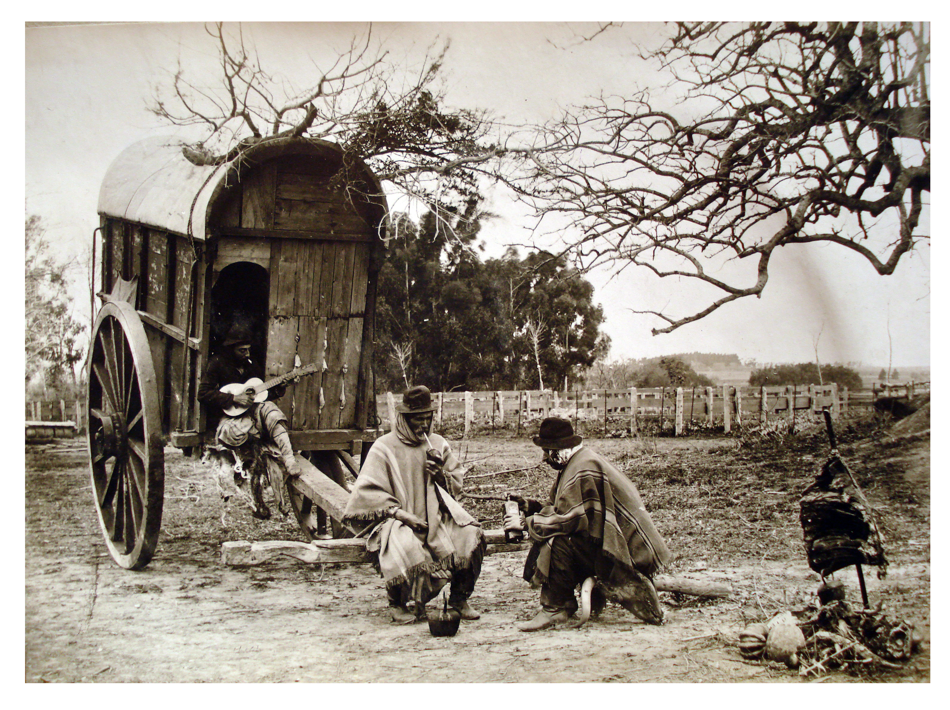 Carreta y gauchos