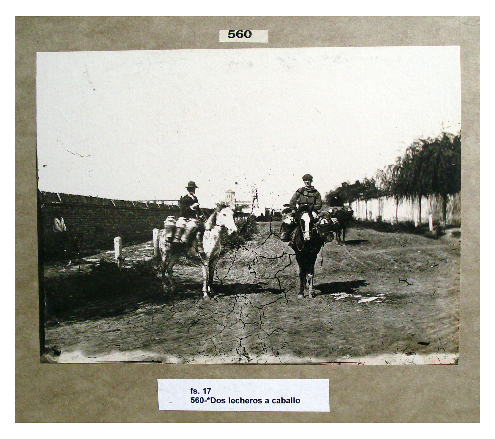 Dos lecheros a caballo