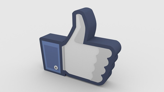 La mano del botón «Me gusta» de Facebook en 3D.