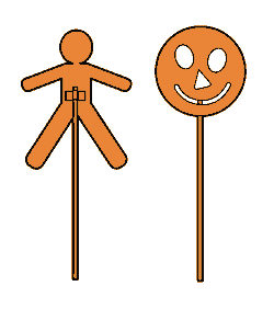 Una figura humana y una carita, cada una con un palito para moverlas.